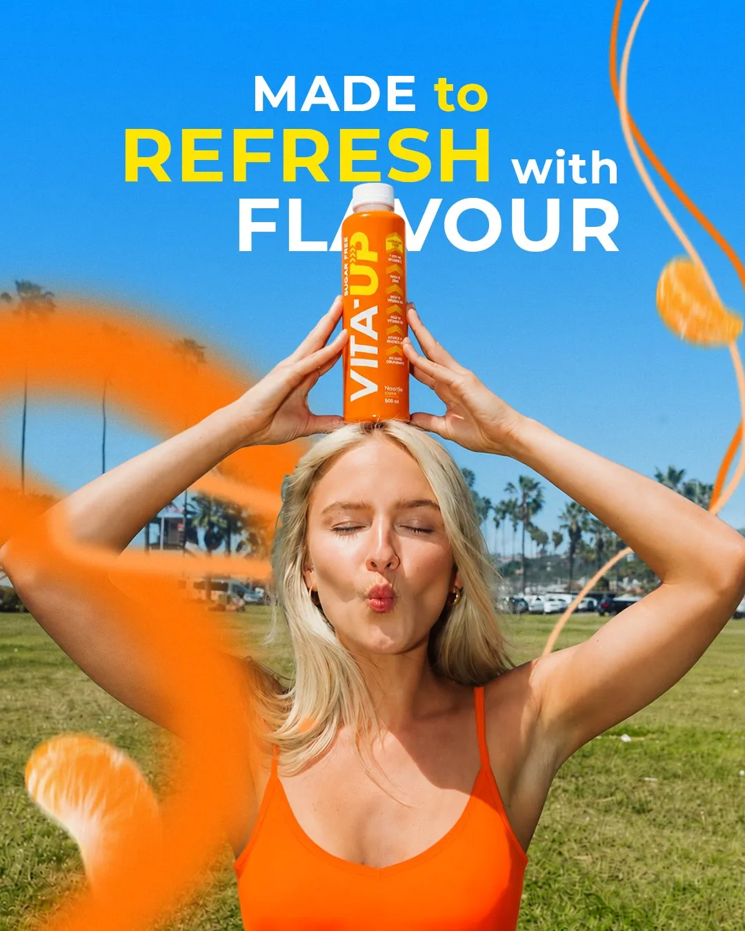 Vita-Up post: Made to refresh with flavour, a woman balancing a Naartjie bottle on her head